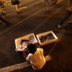A young child sells memorabilia of the late former Cambodian King Norodom Sihanouk at the Royal Palace in Phnom Penh.